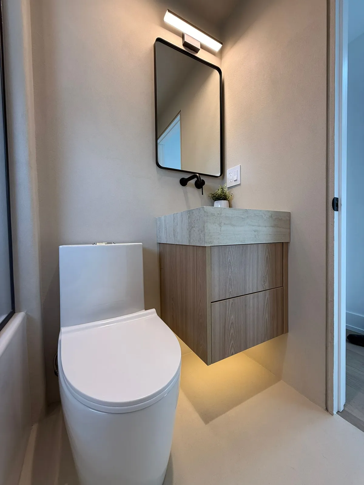 Powder room with seamless microcement walls