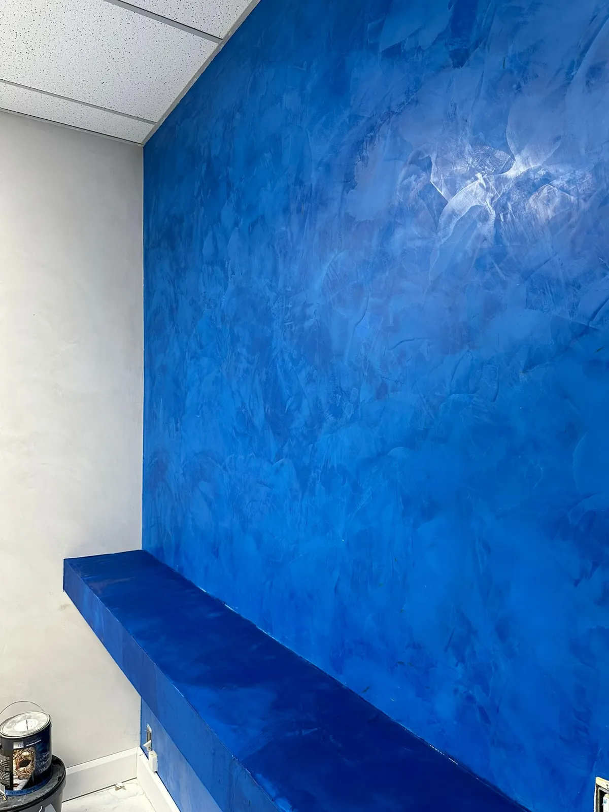 Venetian-blue microcement feature wall